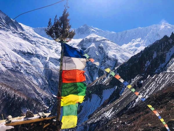 Colorful Prayer Flags Draped Across Mountain Pass Peace And Blessings