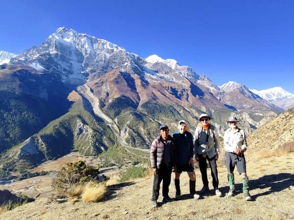 Deep Himalayan Valley With Winding River Lush Green Slopes